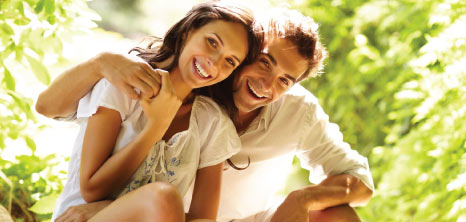 happy couple in trees